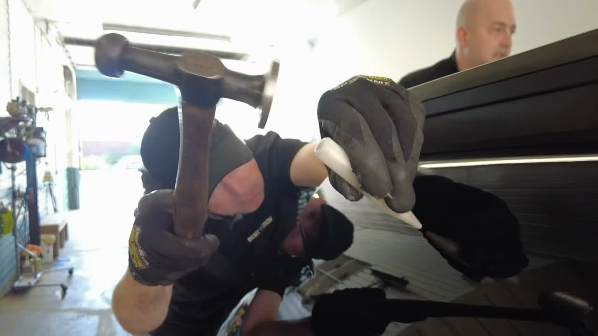 Insurance adjuster examining a vehicle